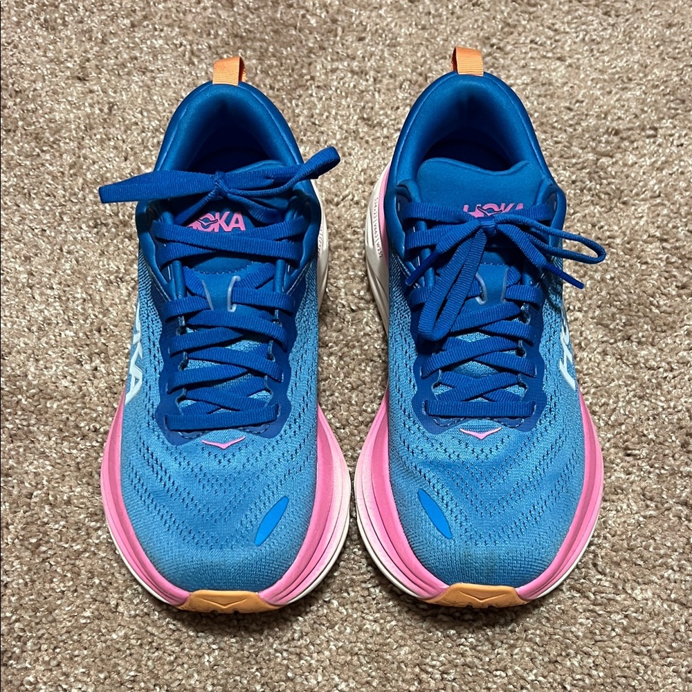 Hoka Women's Blue Running Shoes with Pink and Orange Accents